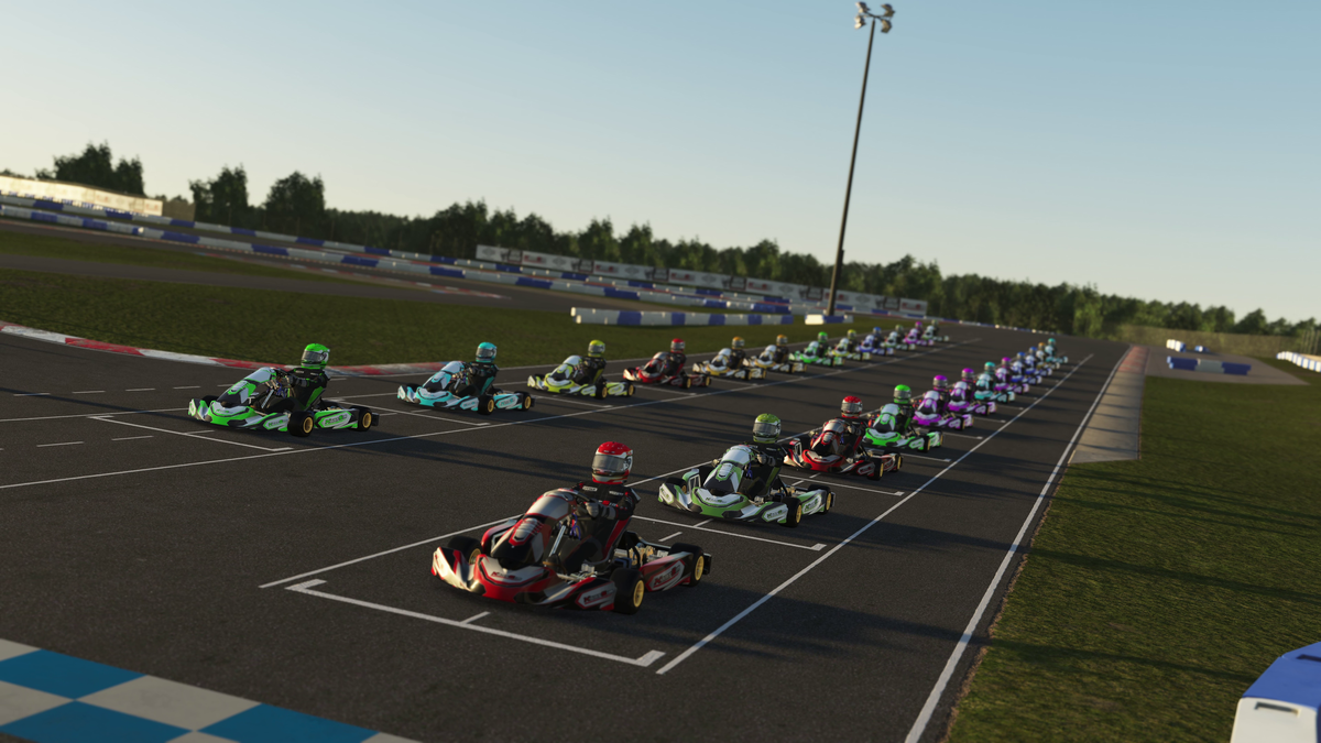 Driver comparing professional KartSim simulator hardware with laser-scanned circuits and realistic kart physics for advanced driver training and coaching.
