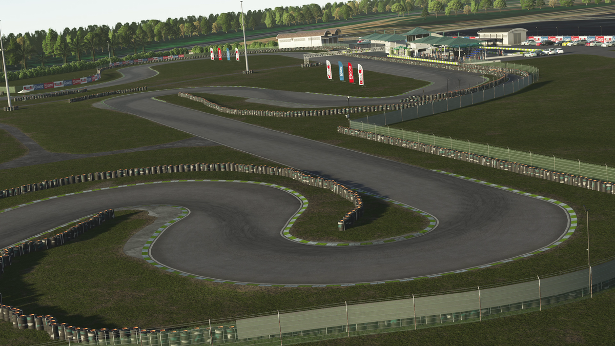 Driver completing a structured training session on a KartSim Pro simulator with laser-scanned circuits, telemetry analysis, and professional coaching to improve lap times and consistency.
