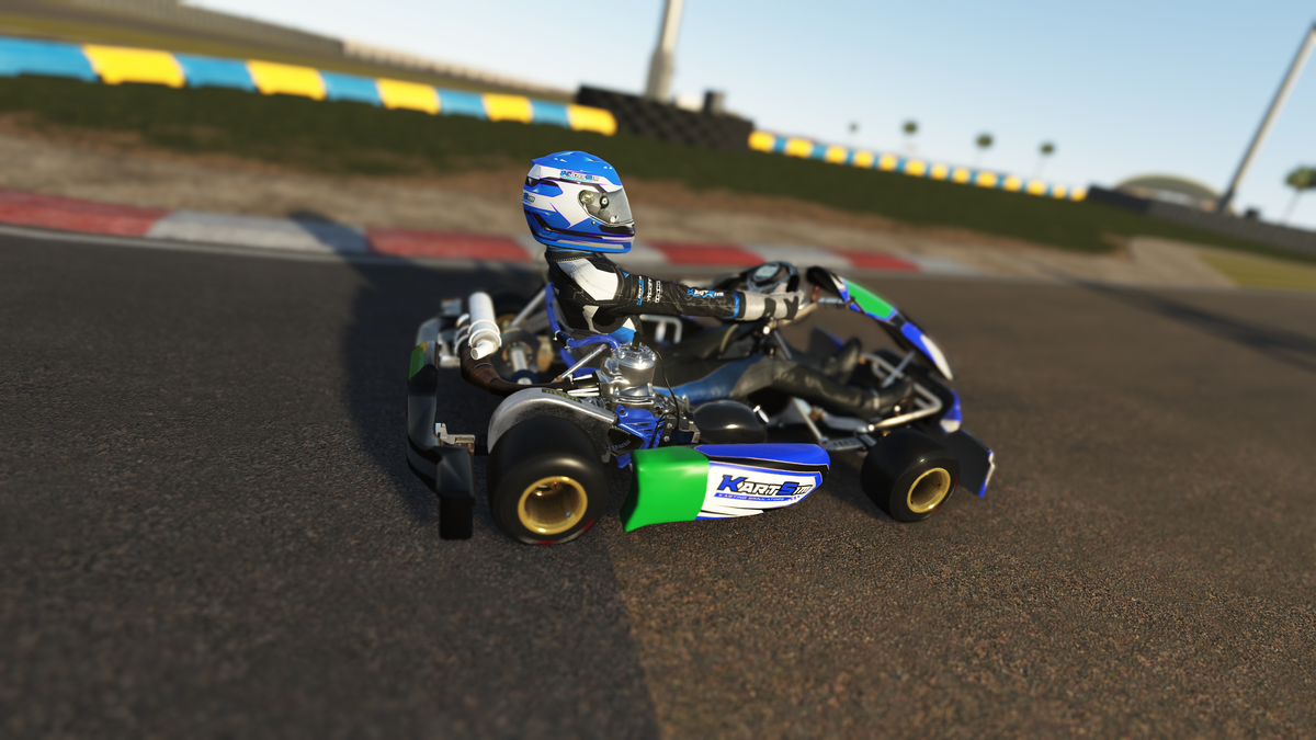 Driver analysing leaderboard results on a KartSim Pro simulator using telemetry, laser-scanned circuits, and realistic kart physics to improve lap times and race performance.