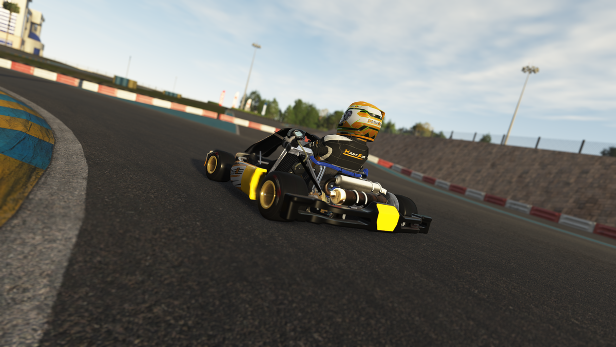 Driver competing in an organised sim racing championship using a KartSim Pro simulator with laser-scanned circuits, realistic kart physics, and telemetry-based coaching.