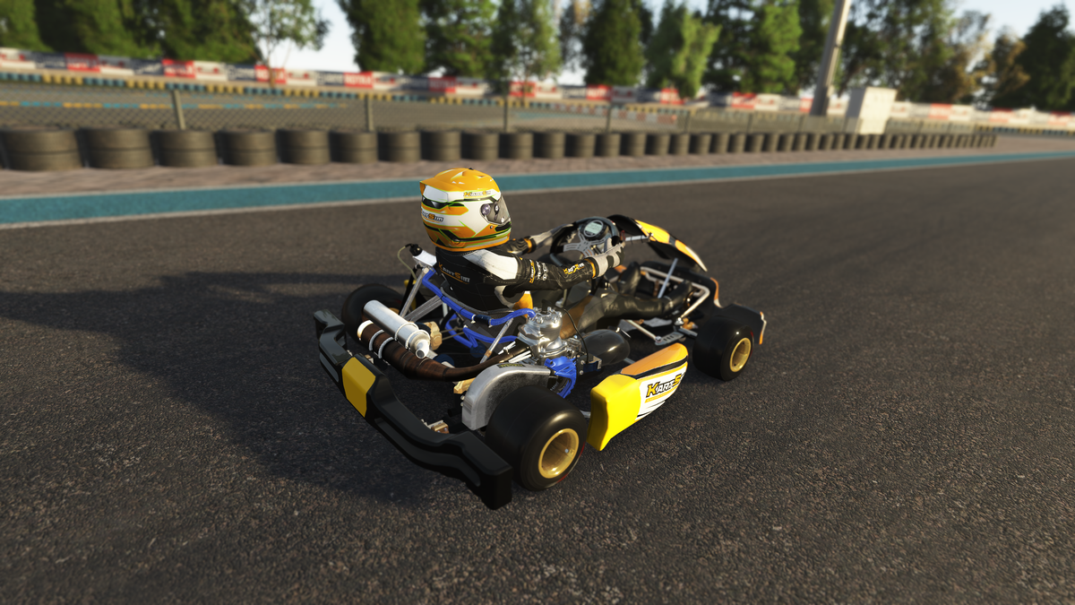 Driver using a KartSim Pro simulator with laser-scanned circuits, realistic kart physics, and telemetry analysis for professional kart racing training.