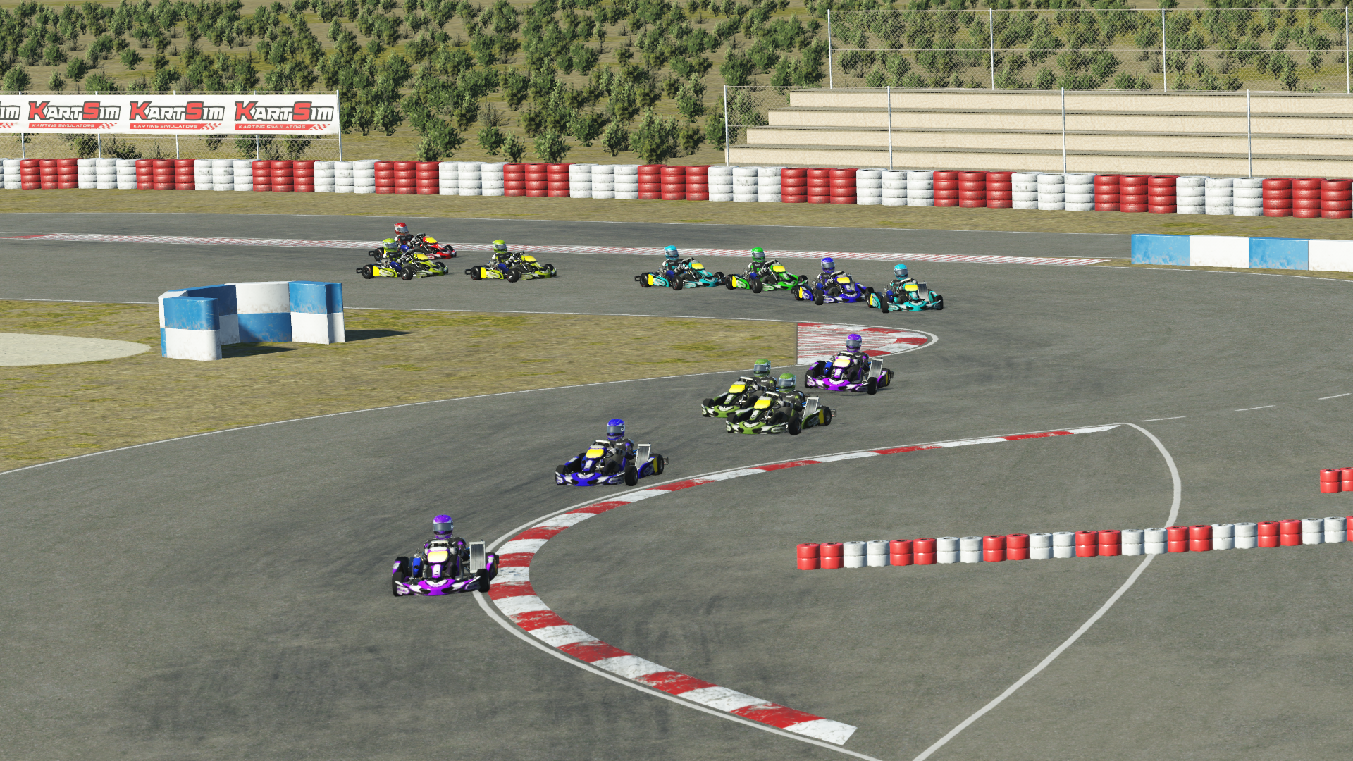 Kart driver using a realistic KartSim simulator to practise racing lines, braking points and racecraft before real-world karting.