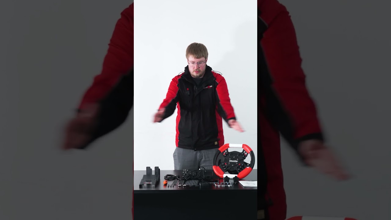 Kart driver training with professional kart simulator hardware and racing wheel setup for performance tuning.