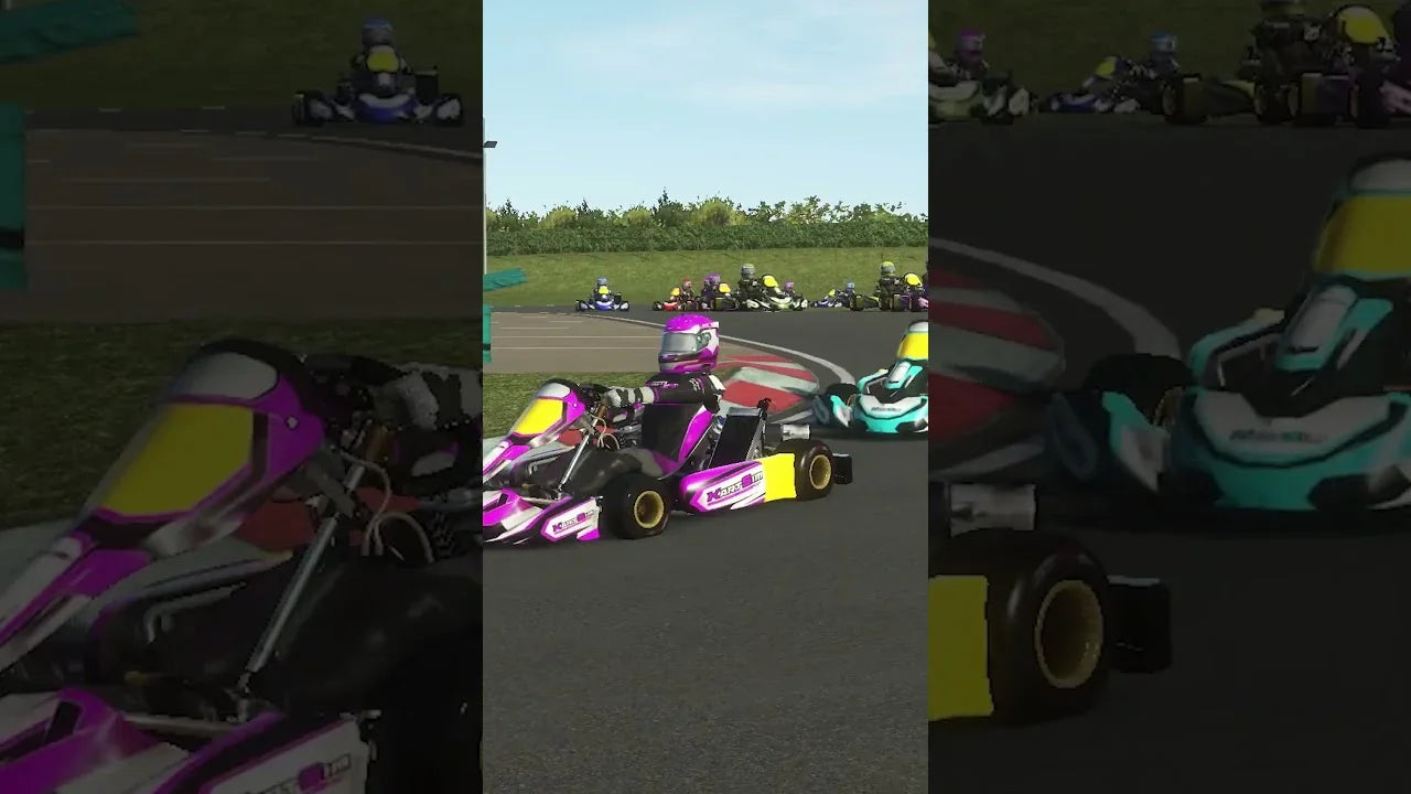 Kart racing simulator software showing multiple karts on a realistic training track for driver training