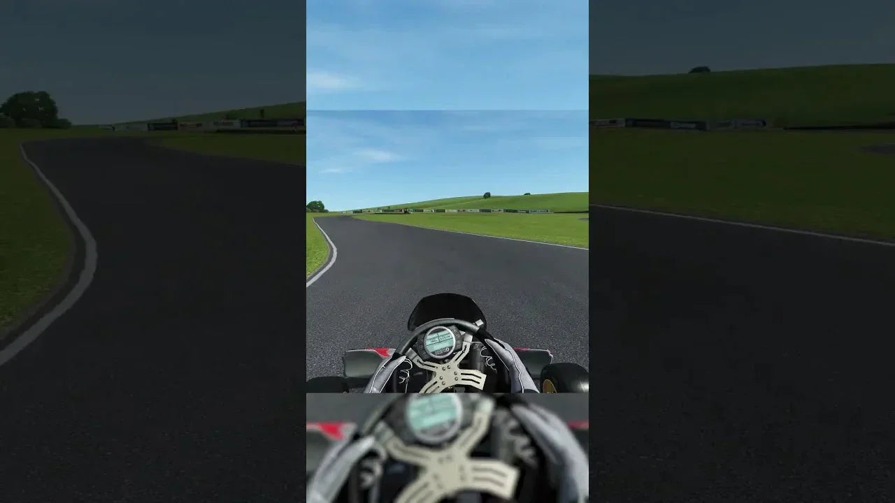 Onboard view of KartSim Pro Software at Glan-Y-Gors circuit, showing realistic driver training using a high-fidelity karting simulator for performance coaching.