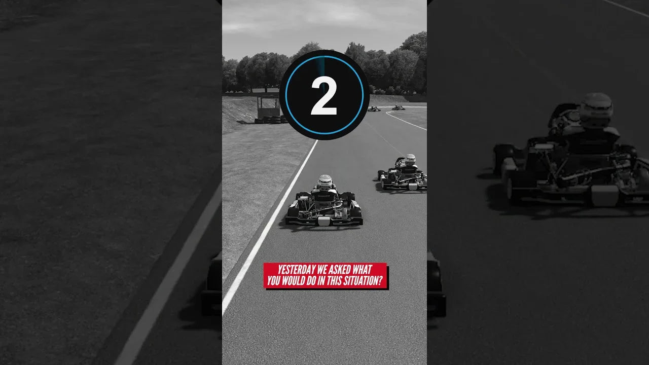 Onboard view at Whilton Mill showing two karts mid-corner at Christmas Corner, revealing the outcome of the racecraft decision challenge