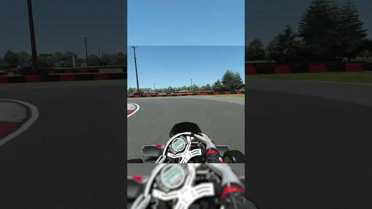 kart simulator cockpit view on realistic track, steering wheel and telemetry for kart driver training