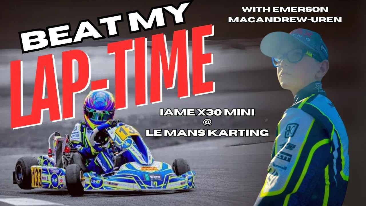 Professional kart driver in race suit and helmet competing in IAME X30 Mini at Le Mans karting track.