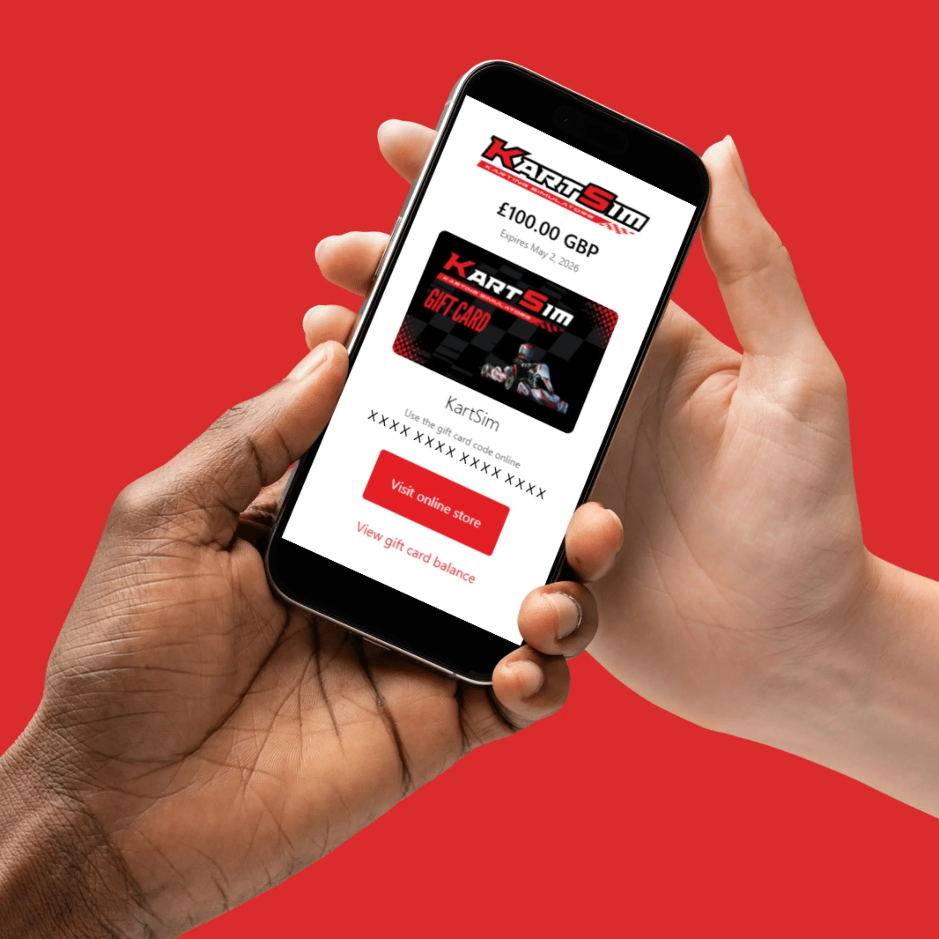 Hands holding smartphone displaying a digital gift card for kart racing simulator and driver training.