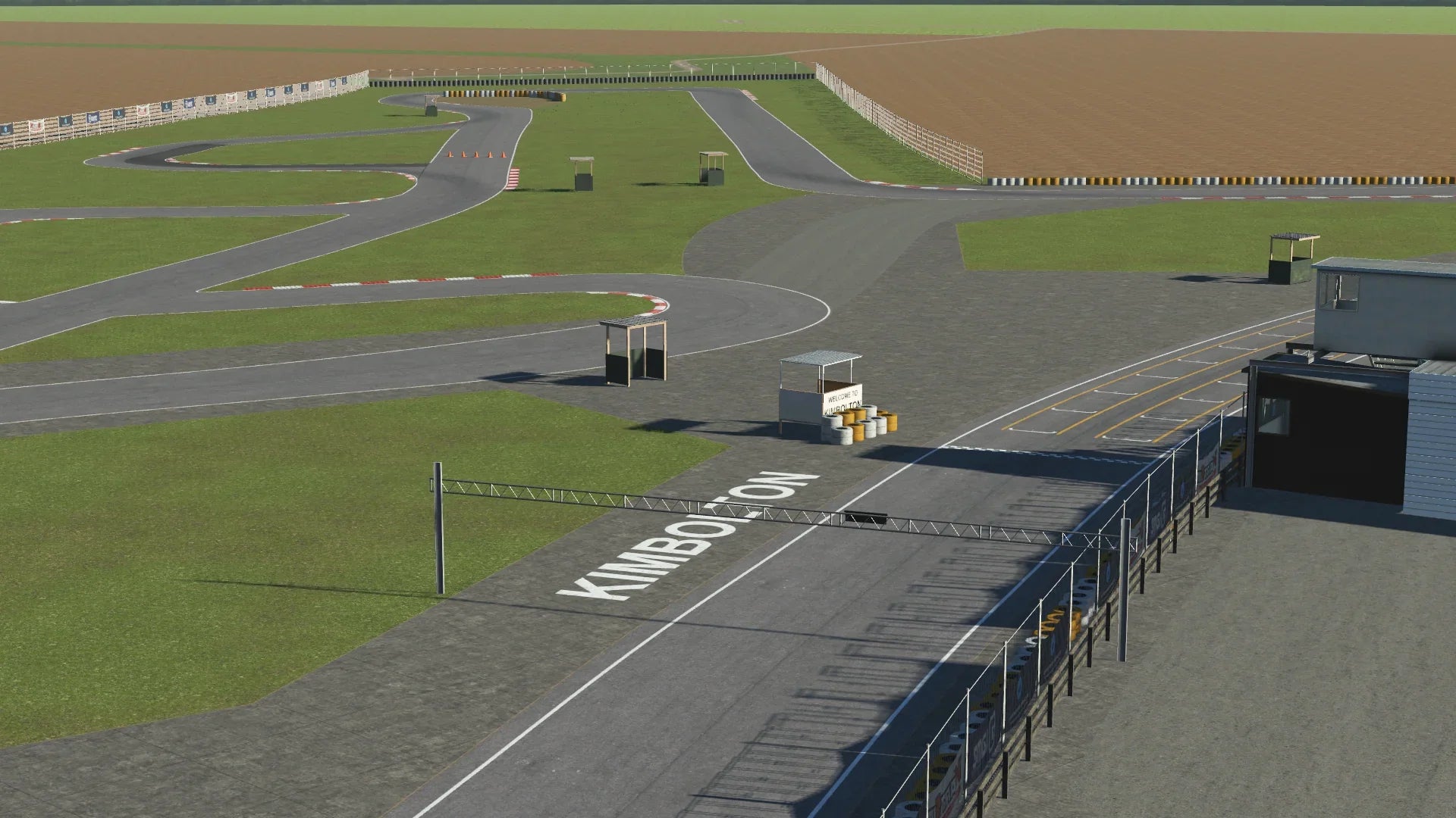 KartSim – Aerial view of Kimbolton Kart Circuit showing the full layout with long straights, tight complexes, and open countryside.