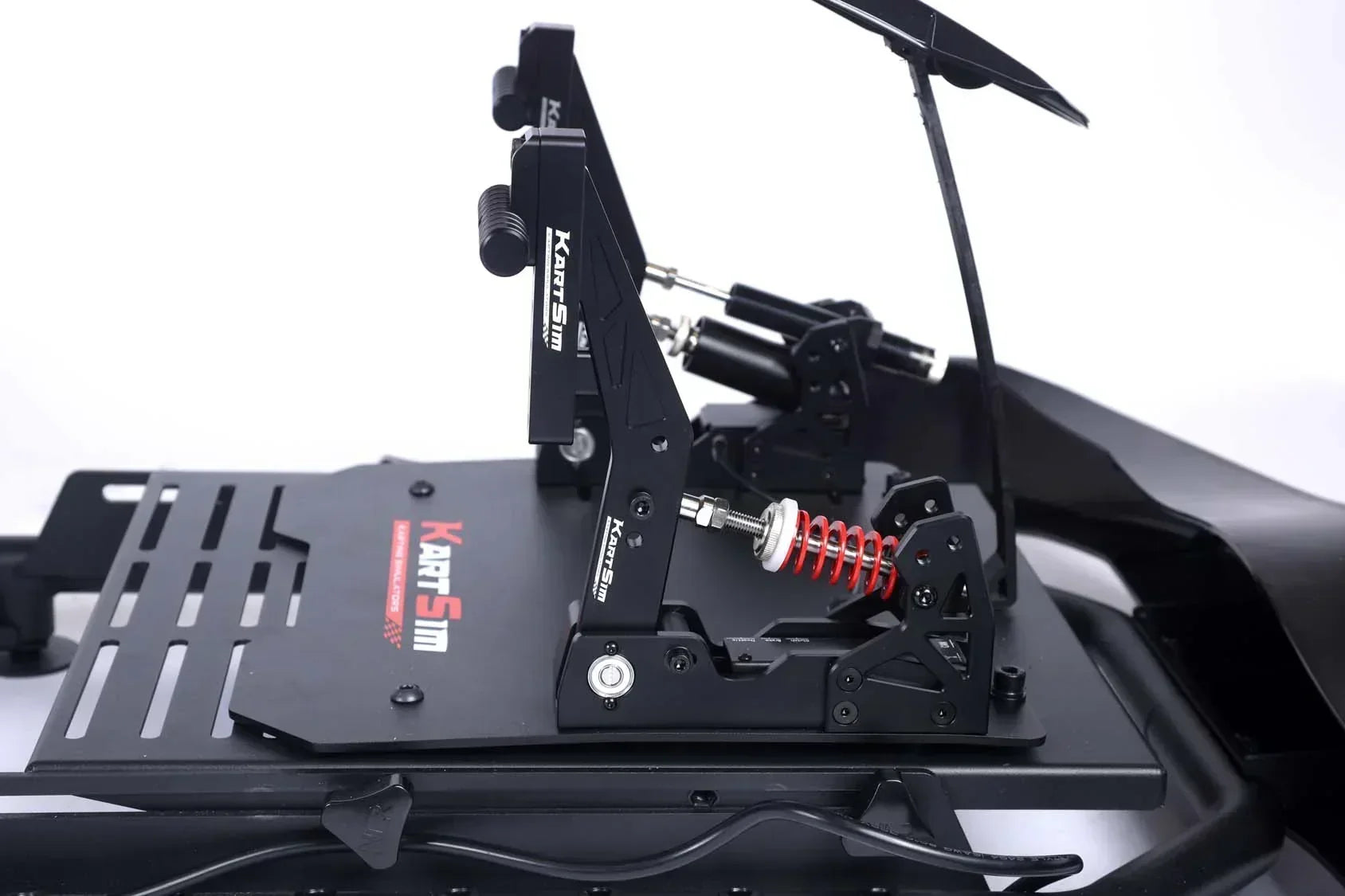 Adjustable load cell pedal system for professional kart simulator, enhances kart driver training realism