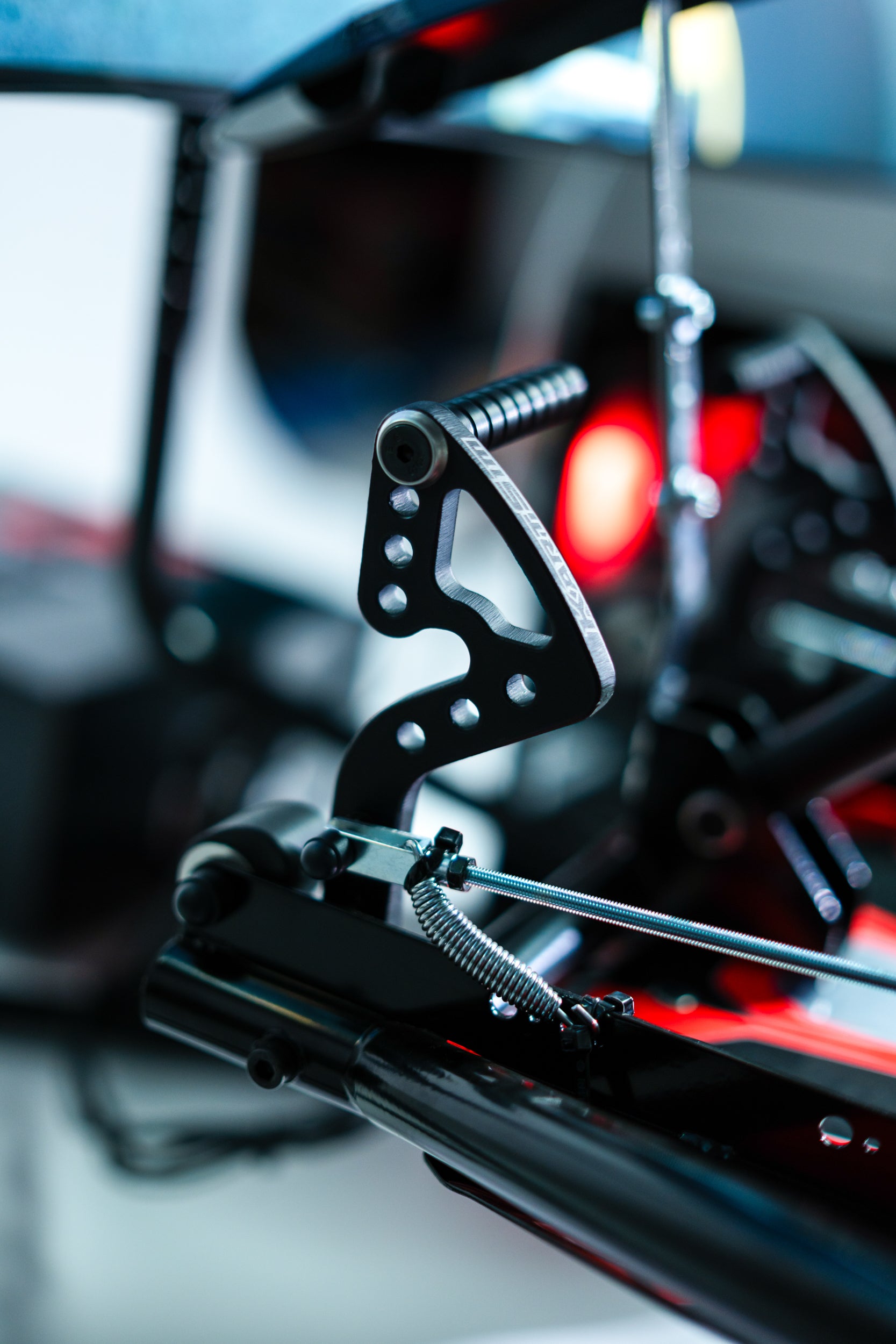 Close-up of KartSim ProSim simulator steering pedals in racing cockpit setup