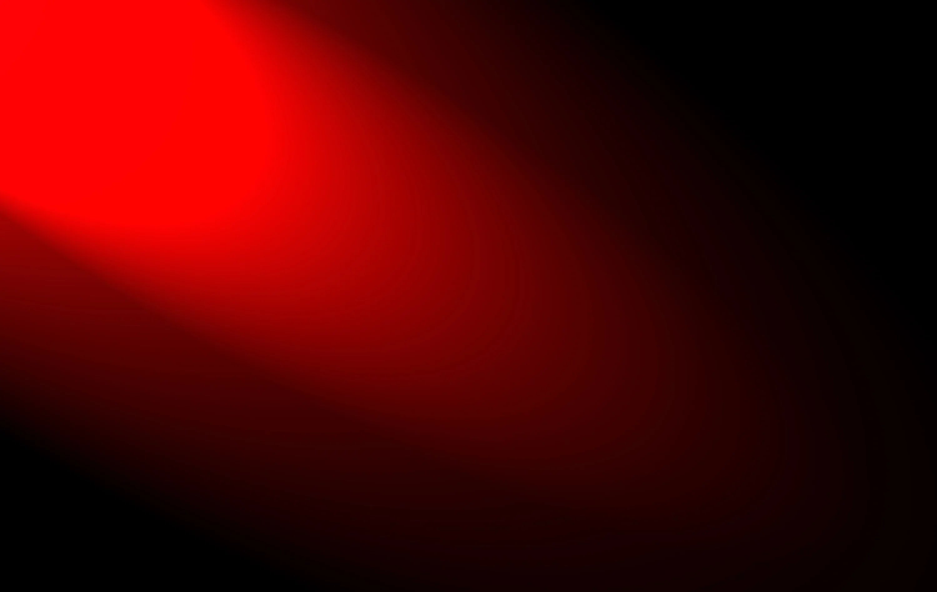 Abstract red-to-black gradient background with a smooth diagonal light effect, creating a dynamic and modern visual style.