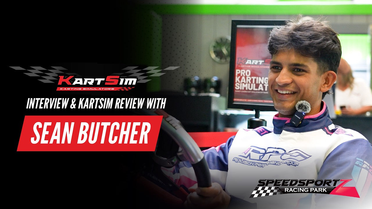 KartSim simulator driver training with professional racing suit and steering wheel setup for karting performance