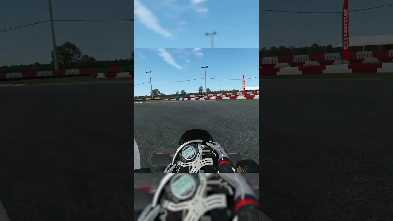First-person view of kart racing simulator with telemetry display for kart driver training realism