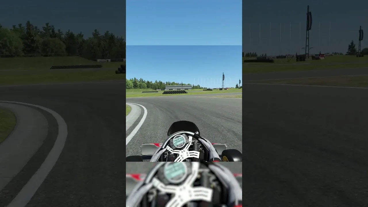 First-person view from kart racing simulator on realistic karting track with digital dashboard
