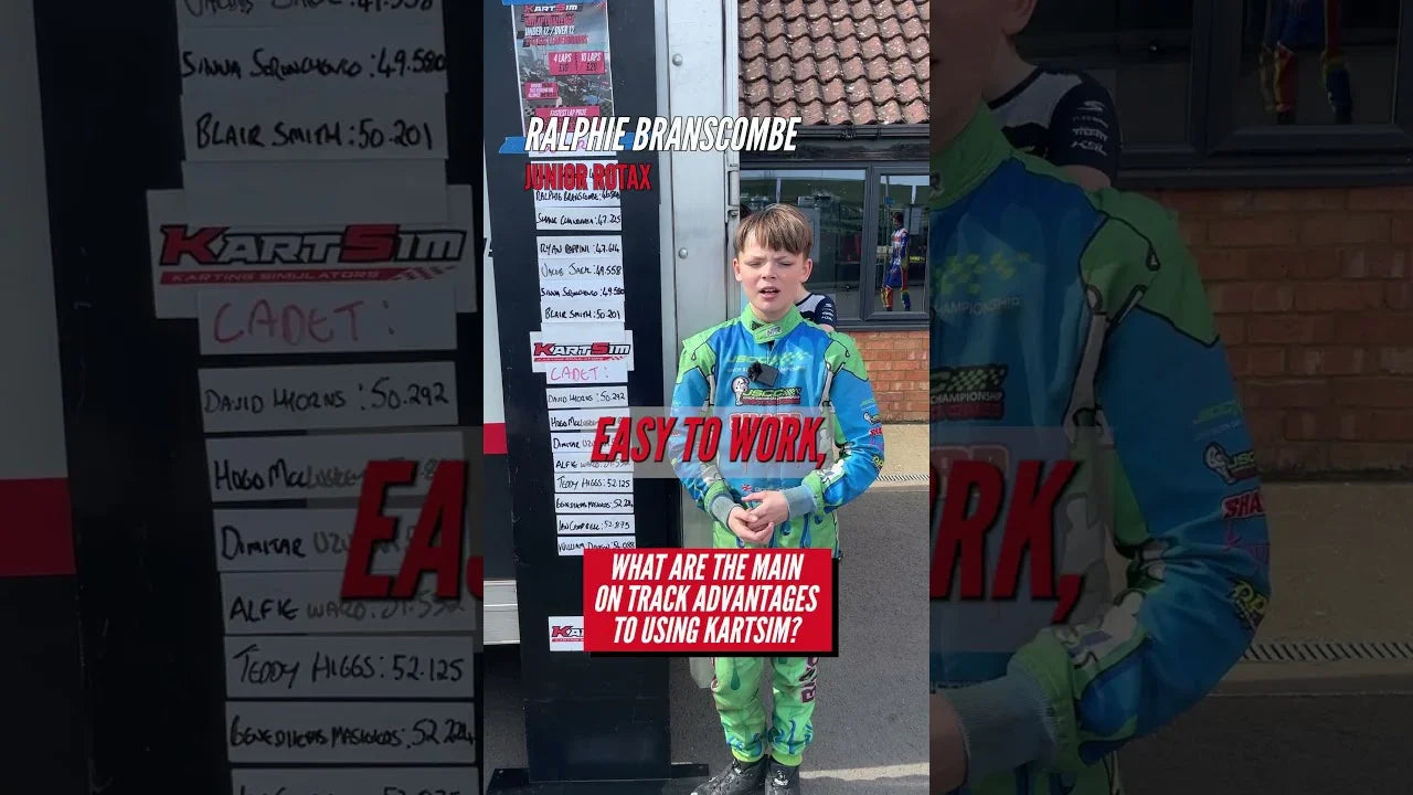 Young kart driver in racing suit discusses KartSim simulator benefits for karting training beside leaderboard.