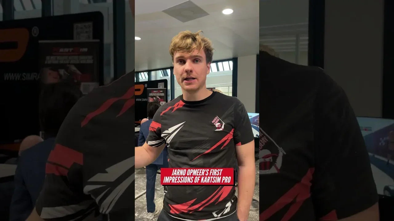 Driver evaluates professional kart simulator setup in realistic karting training environment with KartSim Pro.