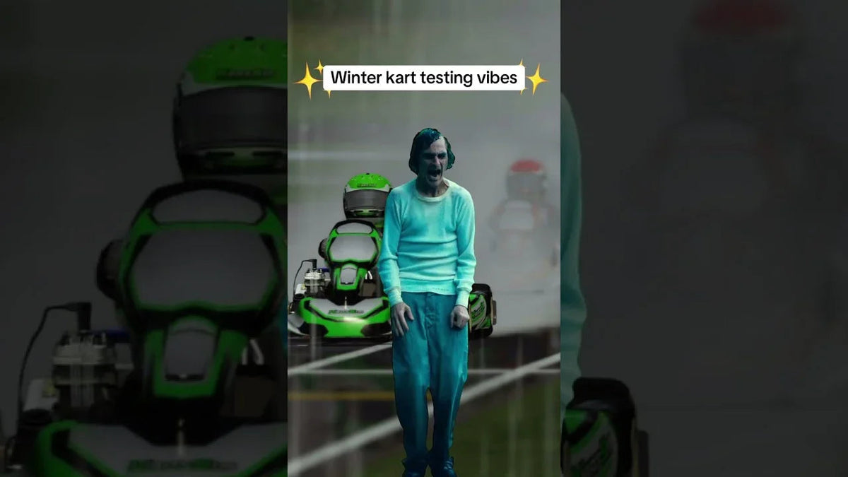 Kart racing simulator winter test scene, realistic karts on wet track, driver in racing gear