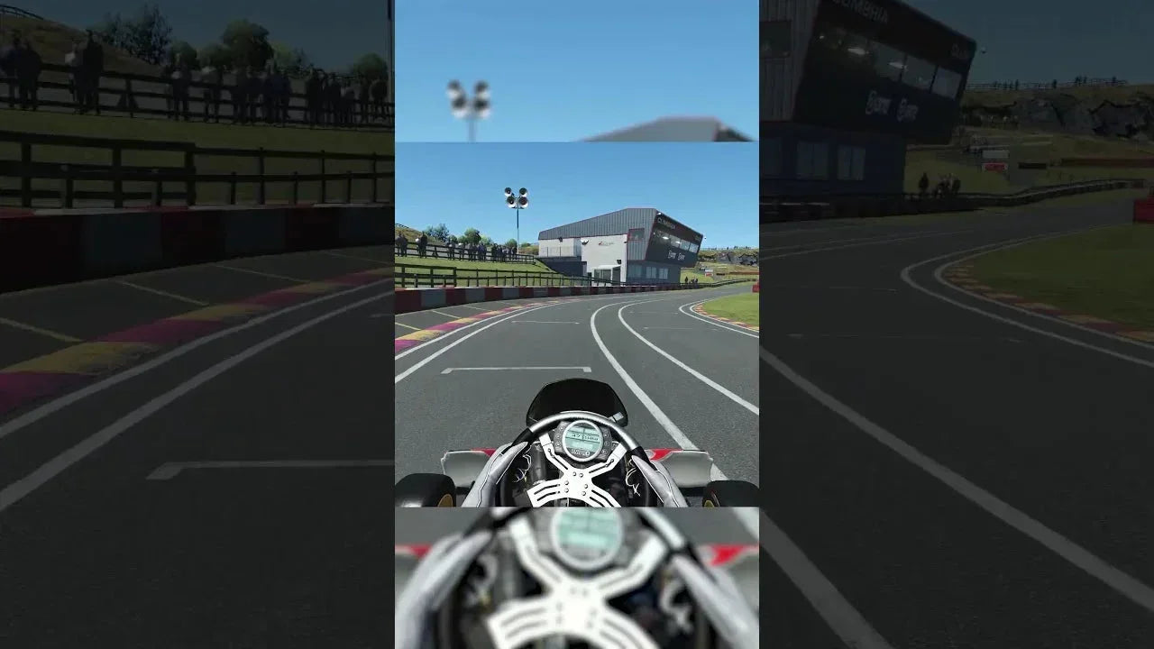 kart racing simulator cockpit view with steering wheel, digital telemetry, and realistic track environment