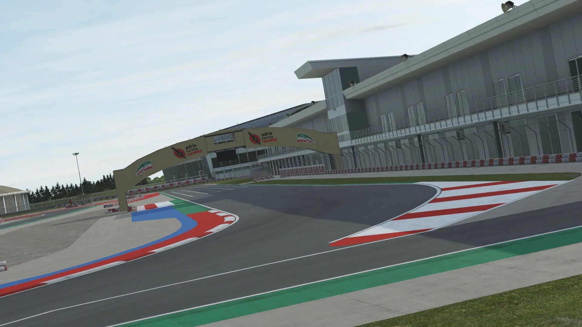 KartSim Adria simulation – race control tower and pit lane infrastructure rendered in karting software for elite-level race prep
