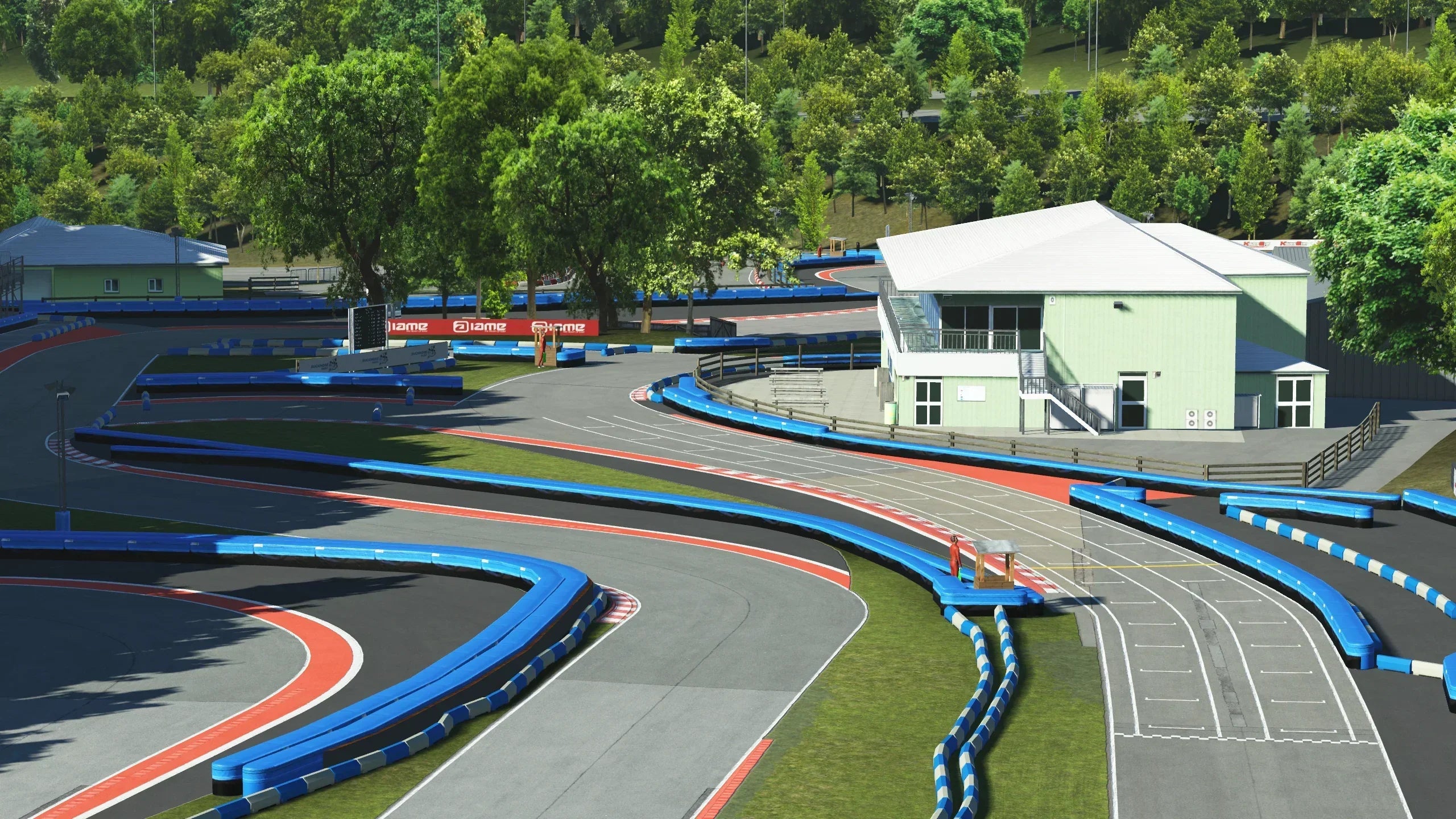 A Scenic Overlook of Buckmore Park – An elevated view of the circuit showing the technical turns, sweeping corners, and lush green surroundings that make this track both challenging and visually stunning.