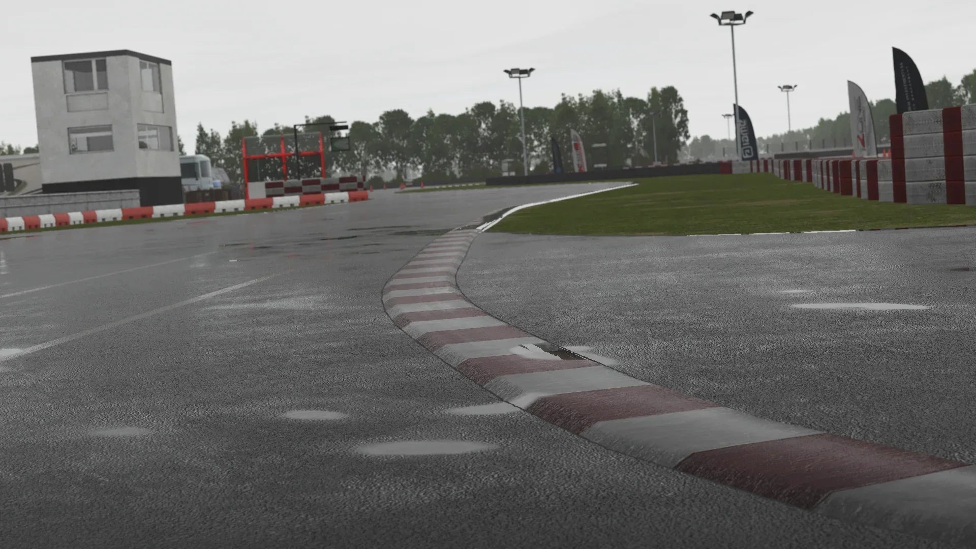 Exit of a fast corner at Llandow in KartSim – KartSim’s detailed representation of Llandow’s corner exit, showcasing realistic track camber, kerb wear, and surrounding scenery.