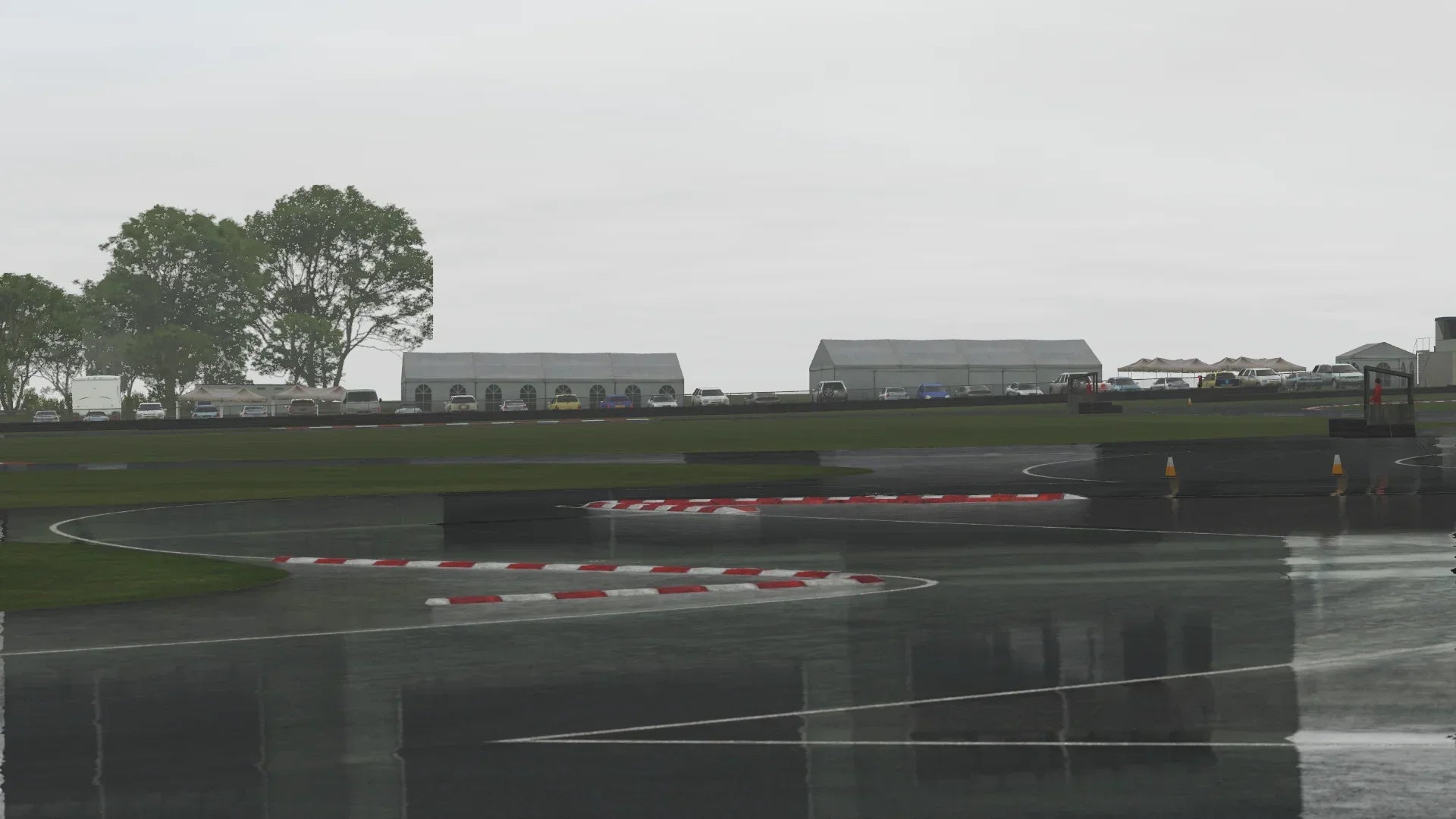 Wet-weather simulation at KartSim’s Rissington circuit, showing detailed reflections, slick surface dynamics, and realistic race-day atmosphere.