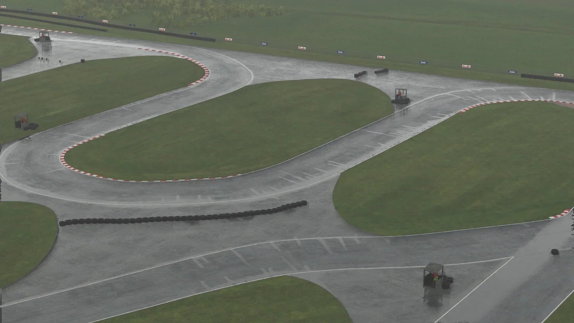 Simulated straight and braking zone on KartSim’s Rissington UK track, surrounded by fencing and detailed runoff areas.