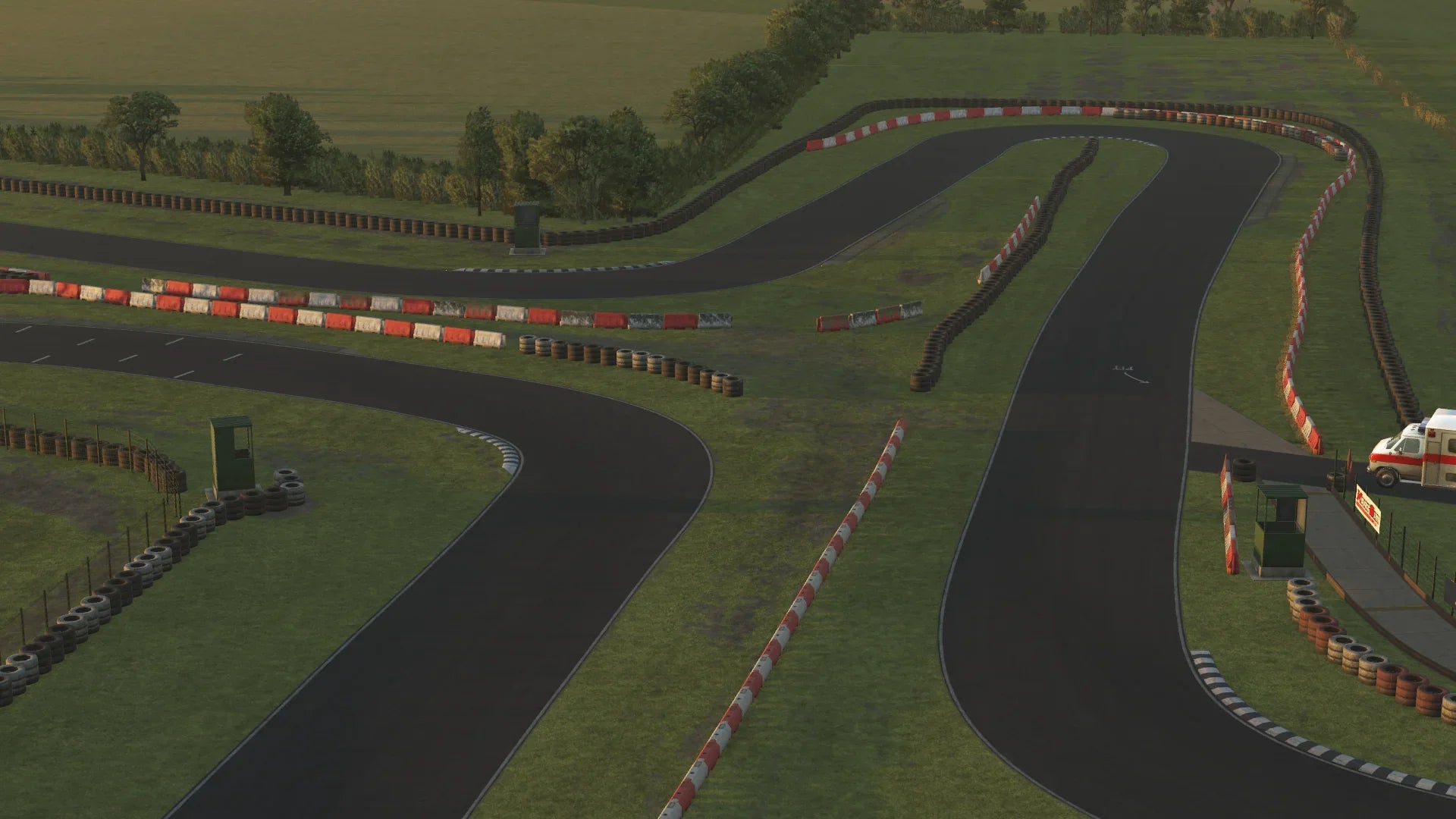 Sunset view of Fulbeck’s long straights and technical corners, set against open fields and natural light.