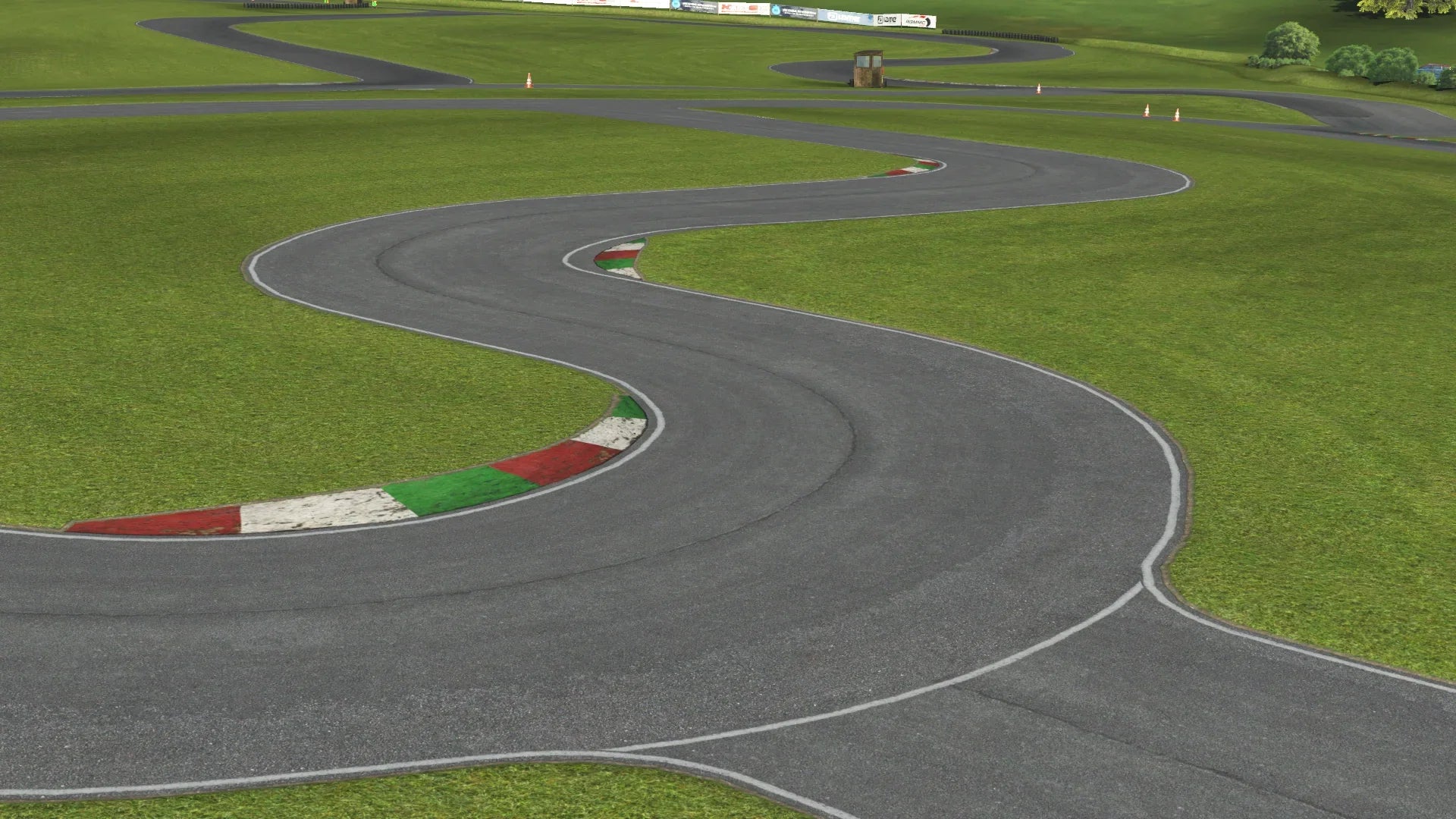 Technical S-bend at GYG – In KartSim, the flowing S-section is defined by red, white, and green kerbs, challenging drivers with precision cornering in the heart of the circuit.