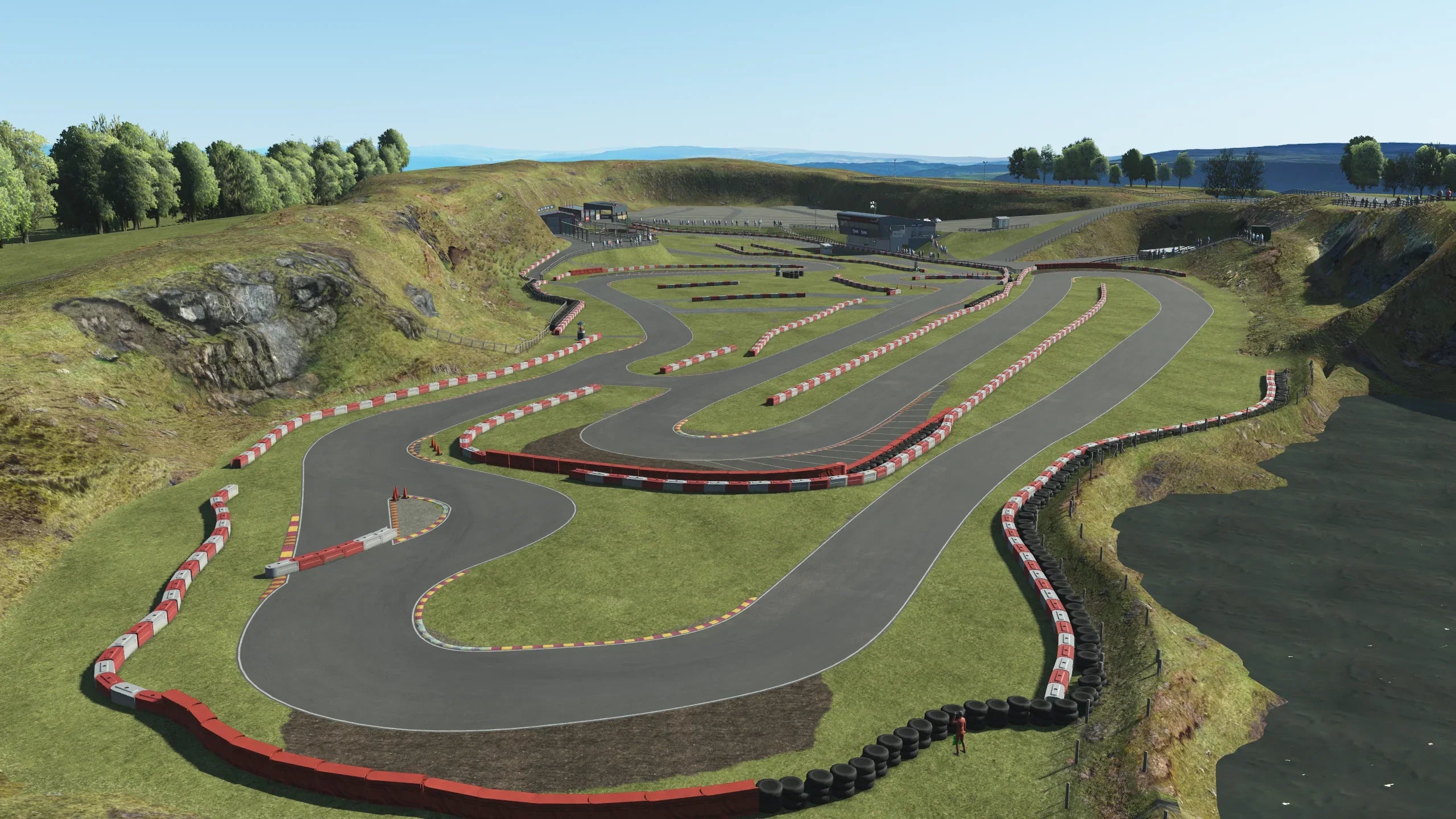 Aerial view of Rowrah kart circuit recreated in KartSim Pro UK, showing the technical layout nestled within the quarry.

