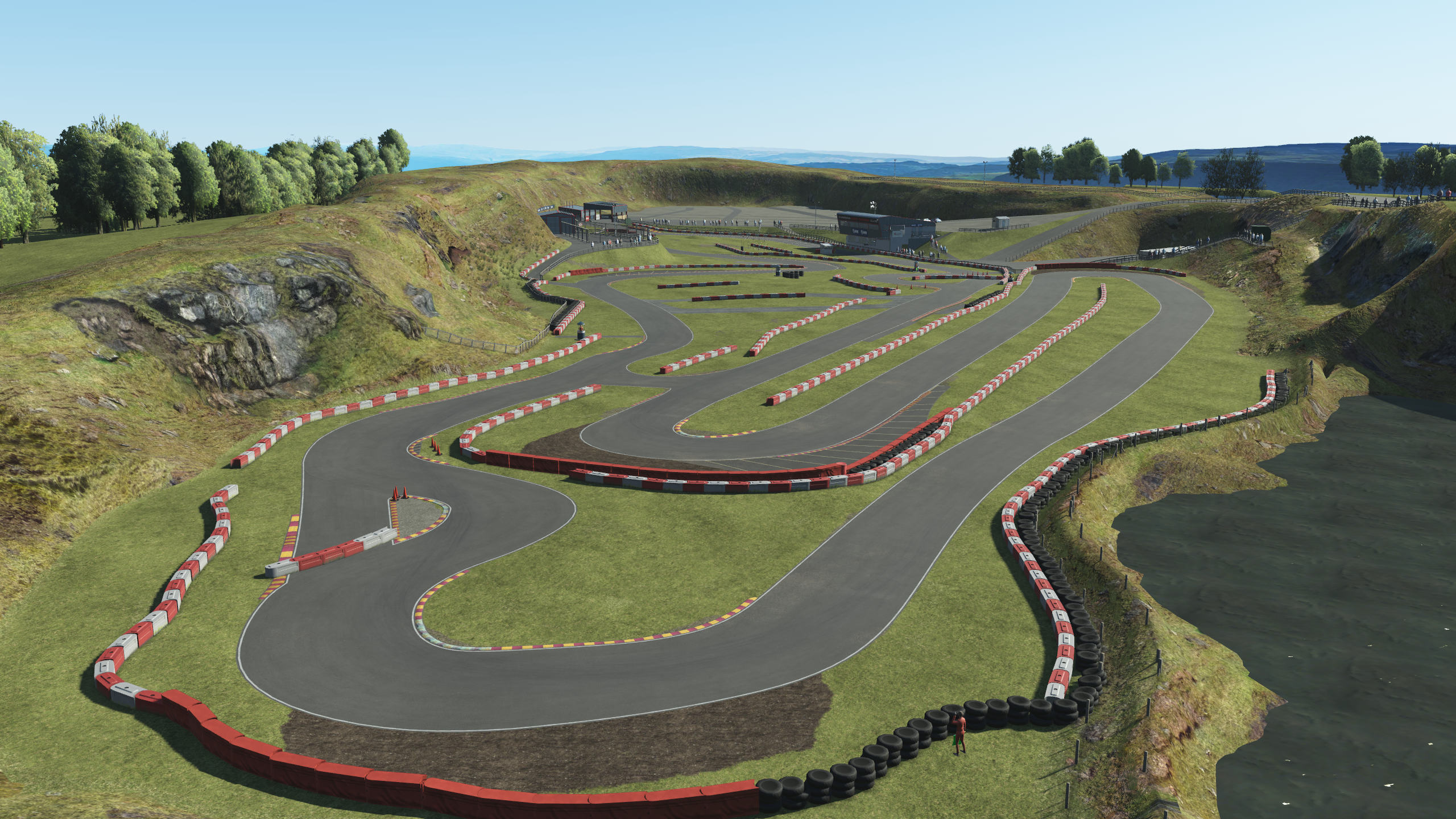 Aerial view of Rowrah kart circuit recreated in KartSim Pro UK, showing the technical layout nestled within the quarry.

