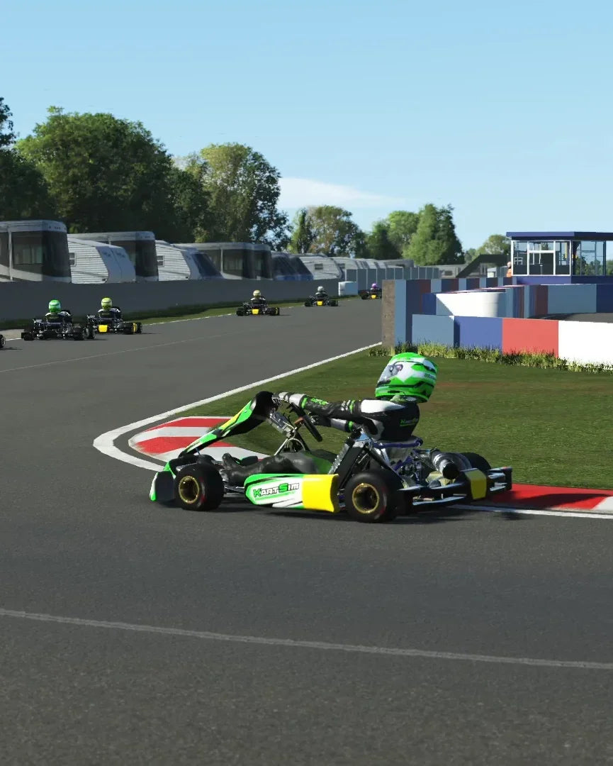  A KartSim simulation image of a green and yellow racing kart taking a tight corner at Donington Park, with multiple karts in the background on a sunny day.
