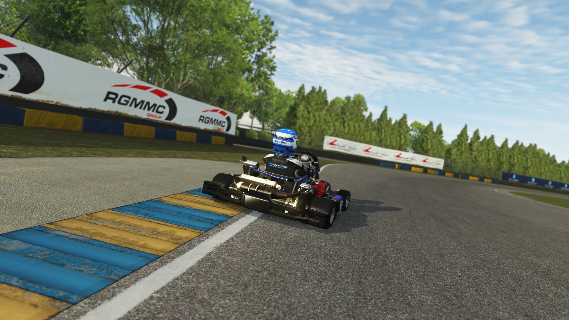 Rear view of Junior OK kart racing on a curving track with trees and race banners, displayed in KartSim kart simulation software