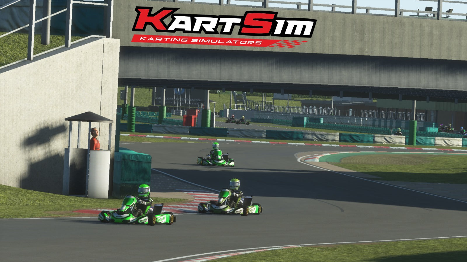 In-game screenshot from KartSim Pro UK software showing kart racers driving under a KartSim bridge banner at a realistic virtual circuit
