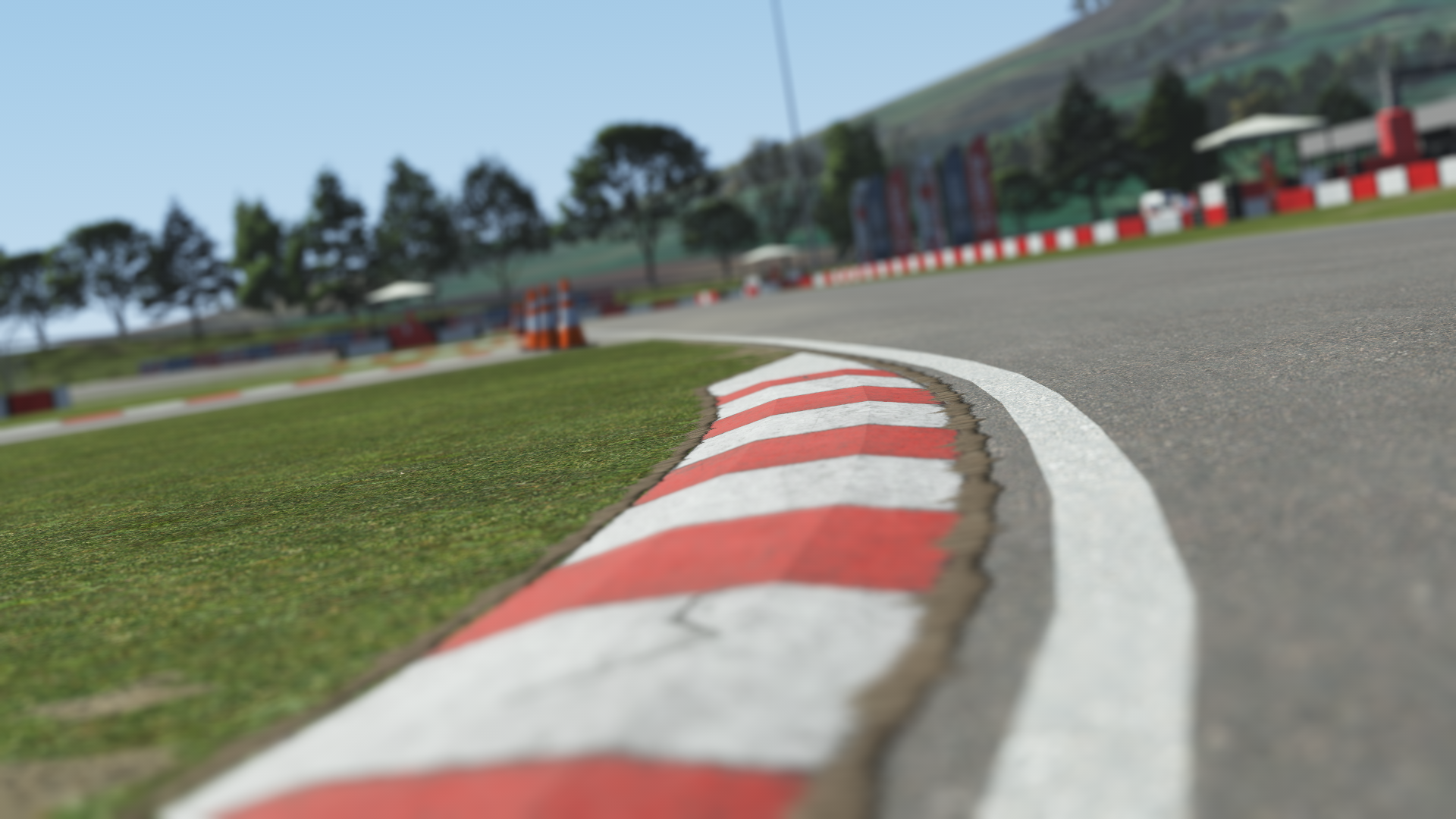 Close-up view of Viterbo Circuit curbing and track edge with blurred background in KartSim kart racing simulation software