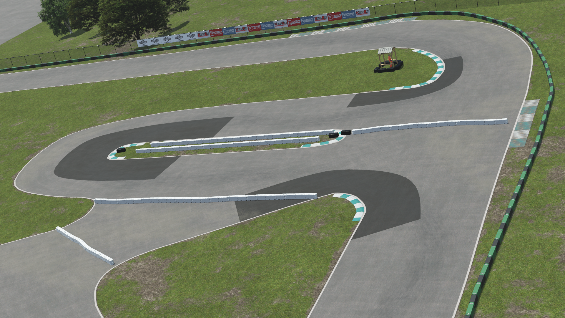 Whiteland kart track hairpin turn – 3D-rendered racing circuit section with barriers, tire stacks, and green curbing