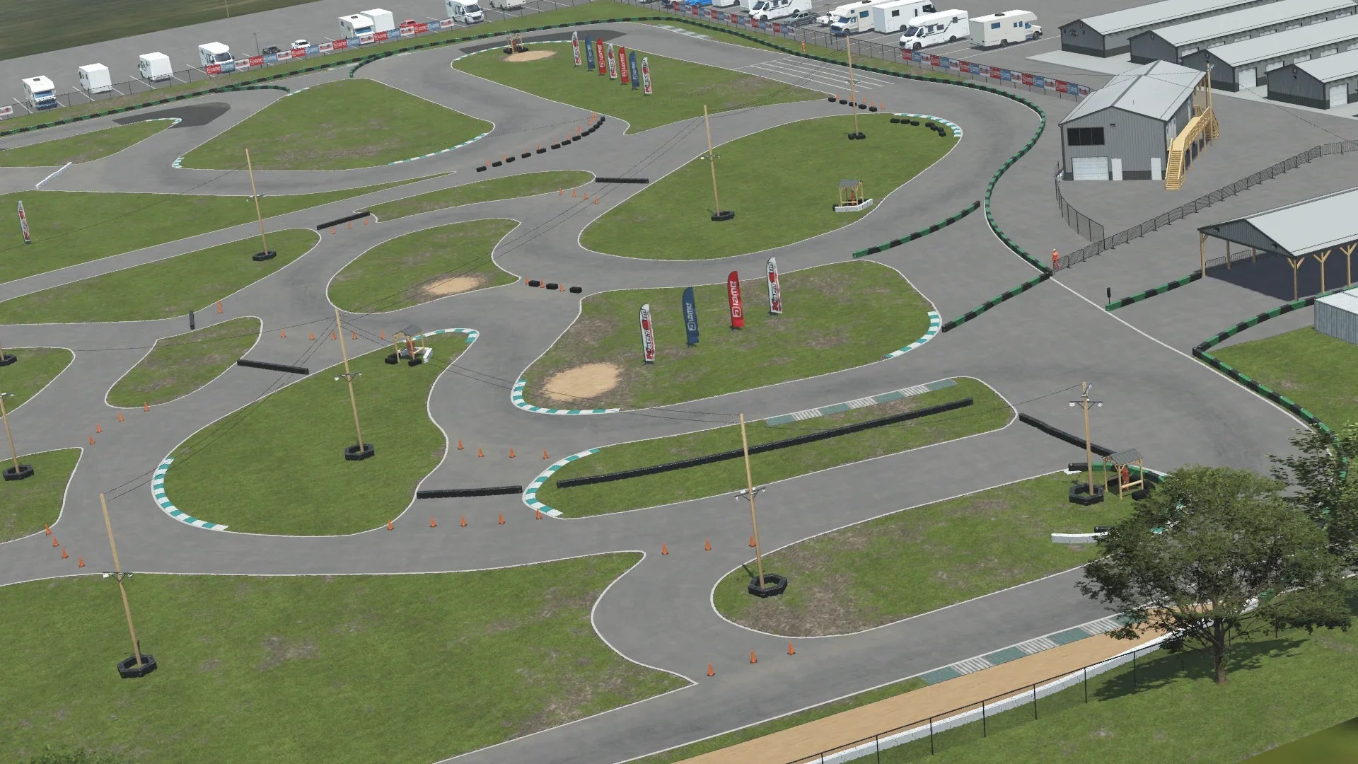 Aerial view of Whiteland karting circuit – 3D-rendered with tire barriers, grass areas, and pit lane buildings