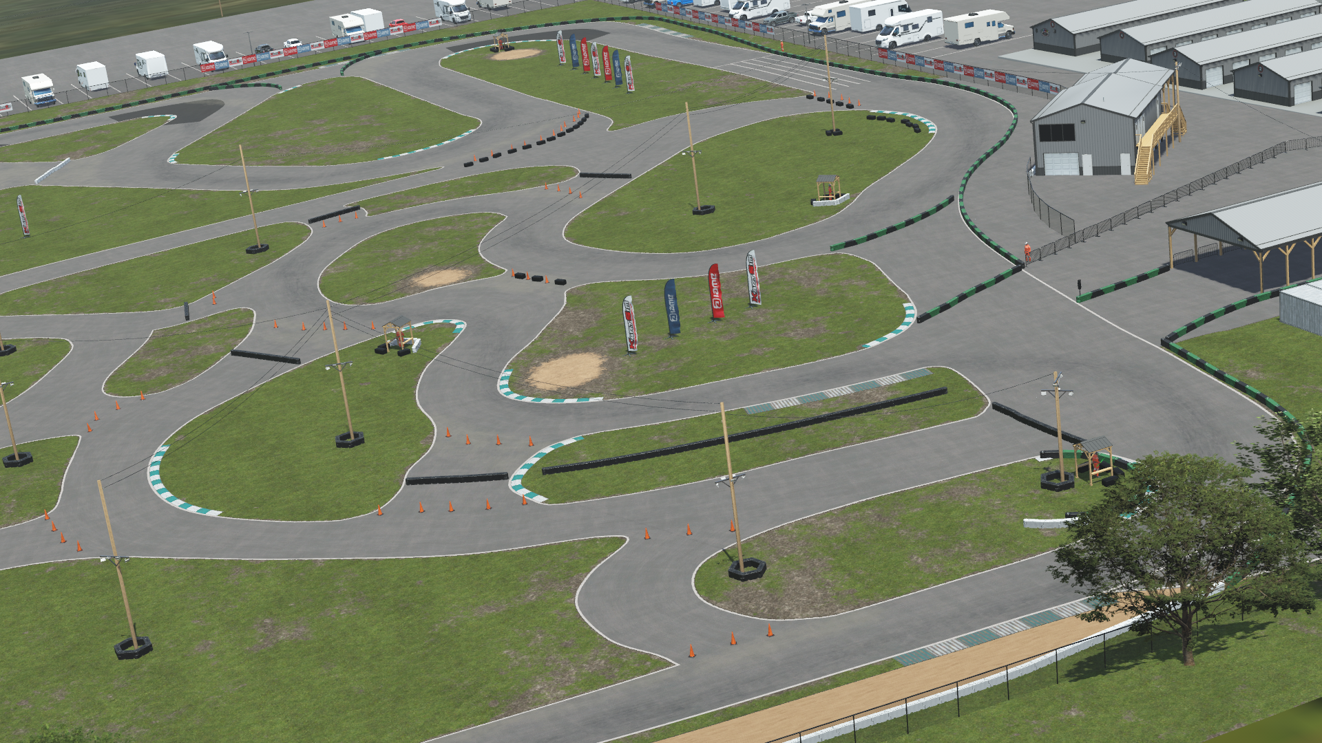 Aerial view of Whiteland karting circuit – 3D-rendered with tire barriers, grass areas, and pit lane buildings