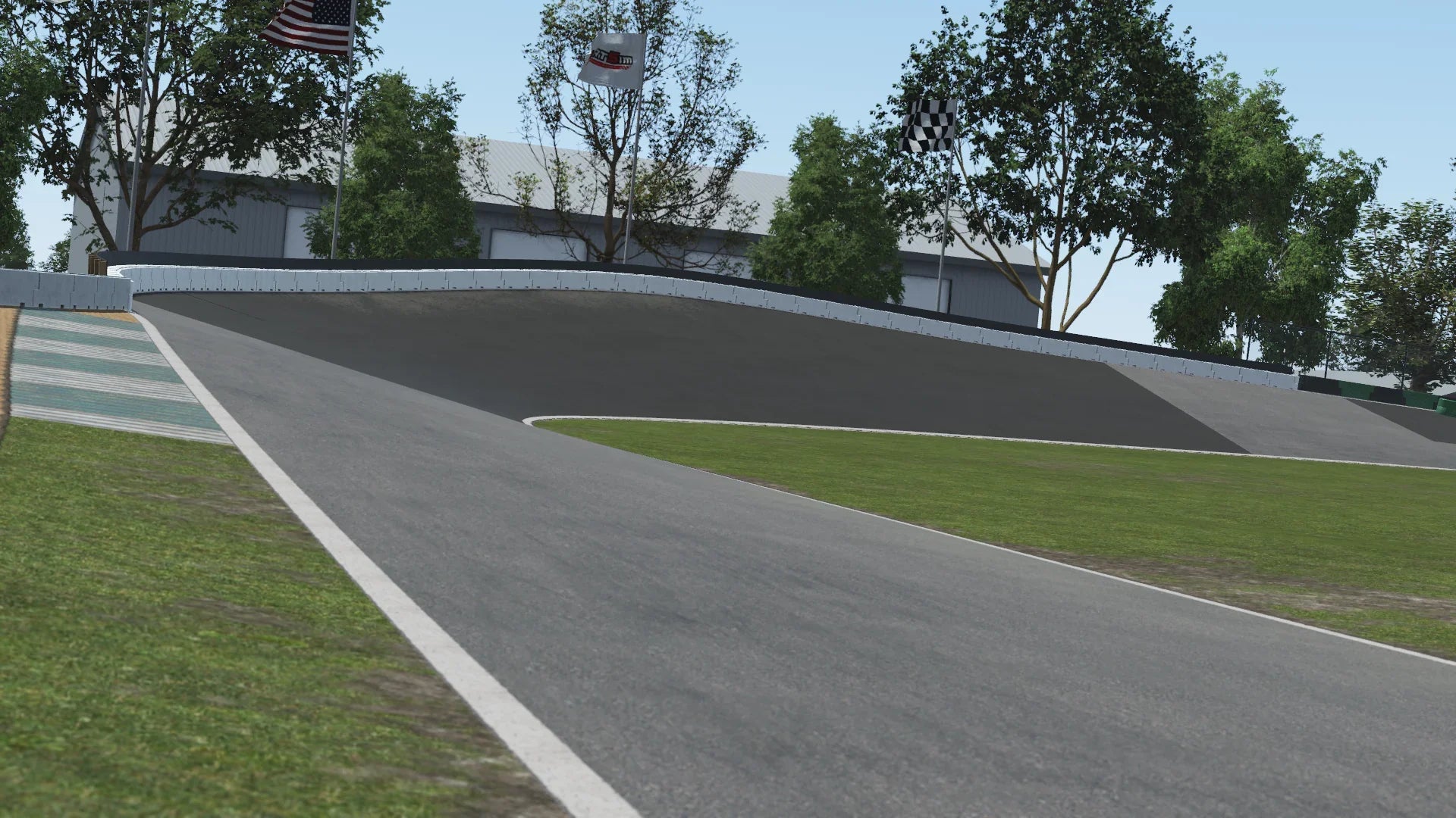 Uphill turn at Whiteland karting circuit – 3D render with curbing, grass verge, safety barriers, and racing flags