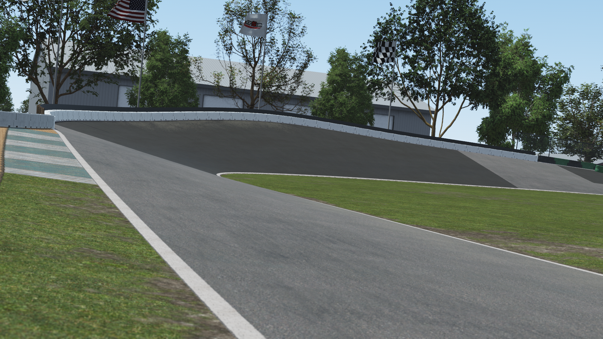Uphill turn at Whiteland karting circuit – 3D render with curbing, grass verge, safety barriers, and racing flags
